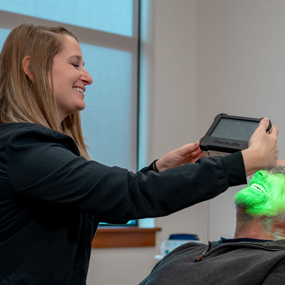 Patient having photogrammetry scan taken.